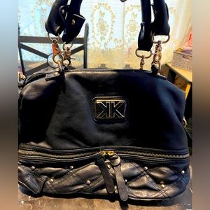 Kim Kardashian  black purse